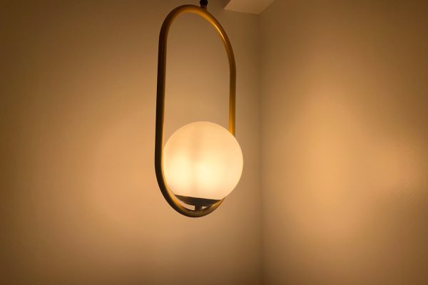 Photo industrial swing arm wall lamp
