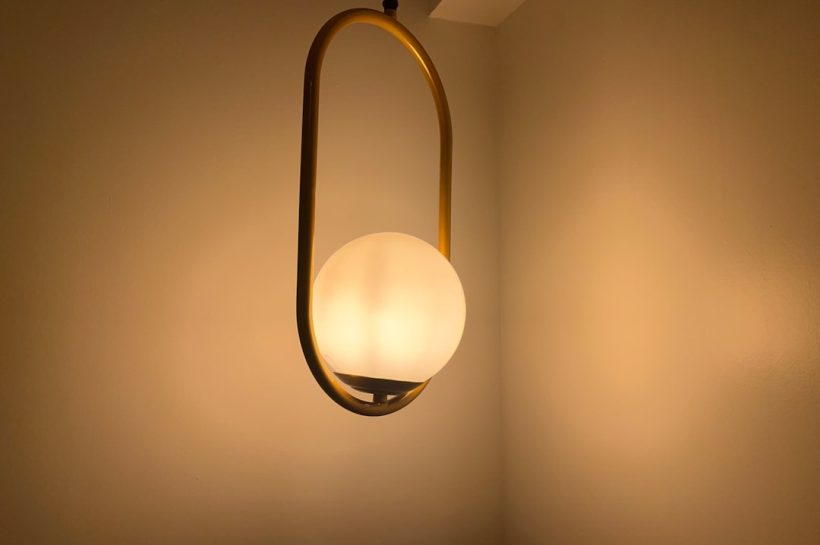 Photo industrial swing arm wall lamp
