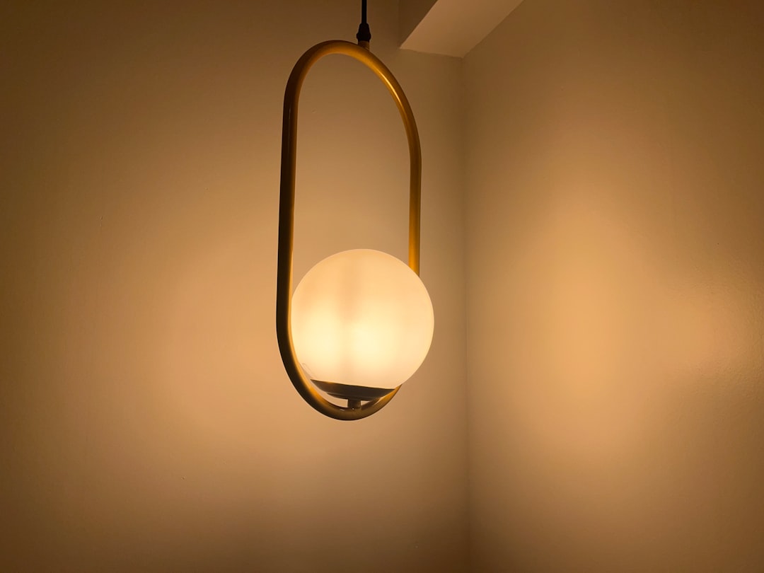 Photo industrial swing arm wall lamp